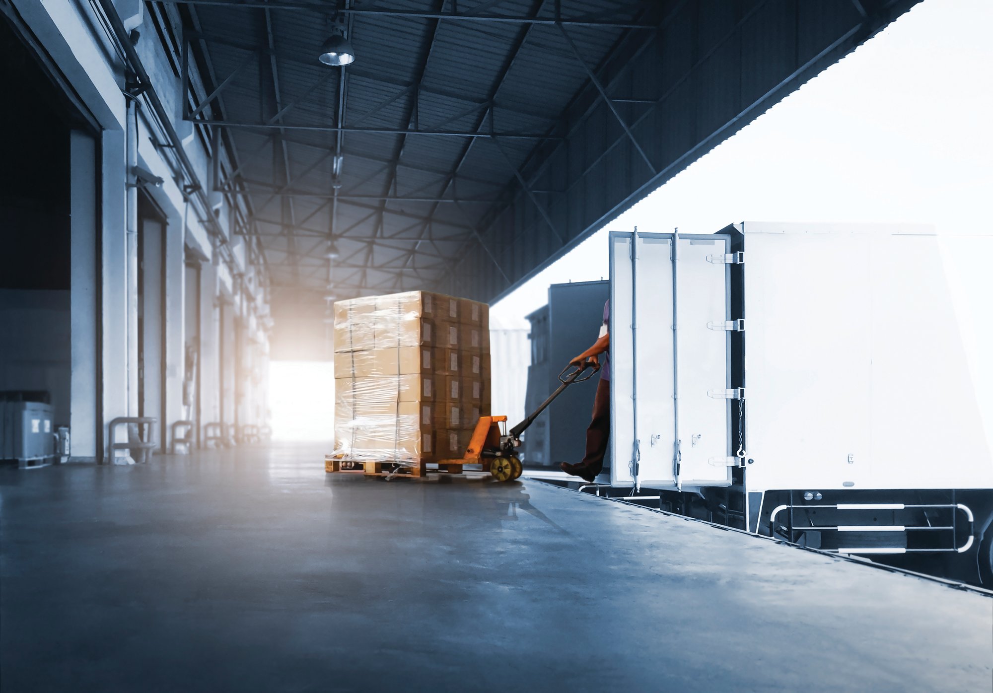 workers-unloading-package-boxes-into-cargo-container-loading-dock-warehouse-cargo-shipping-transport workers-unloading-package-boxes-into-cargo-container-loading-dock-warehouse-cargo-shipping-transport